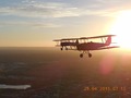 No 77 Squadron Association Interesting Shots photo gallery - DH82A VH-FAS ( DHA34) Tiger Moth, Flown by Mick Harcourt and Paul Falconer-West. Aircraft owned by the Royal Aero Club of Western Australia.   FAS was the former A17-37.  It was civilianized in July 1947 as VH-RJA for Ronald   J. Annetts of Melbourne, operating under the snappy name of Hire or Fly Yourself And Air Services Pty Ltd at Essendon.   In 1949, it went to Furness Aviation of Parafield, SA, who re-registered it for their initials as VH-FAS.  It was purchased in 1959 by Superspread Pty Ltd of Moorabbin.   After its crop spraying days were done, it was acquired by the Royal  Aero Club of WA at Jandakot as kind of a nostalgia machine, and re-painted as a warbird. DH82A VH-BTP(A17-744)( MSN DHA1075/T315)    Tiger Moth, Owner Clark Rees and passenger Helen Tomkinson.  Boeing  VH URC Stearman.  Owner Rod Edwards and passenger was his wife Anita Edwards.